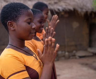 Girls are praying