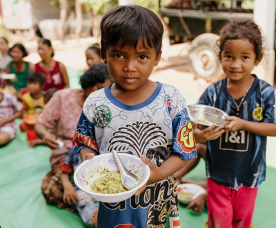 Two Childrens with food.