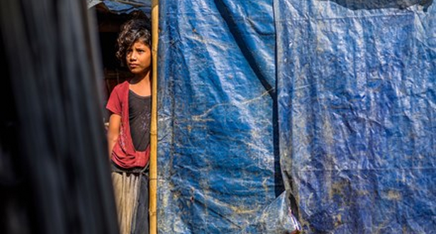 Child standing in her home