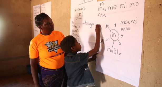 Rabson from Zambia learning in the reading camp. 