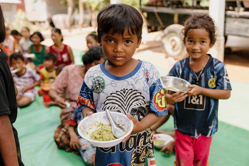 Two Childrens with food.