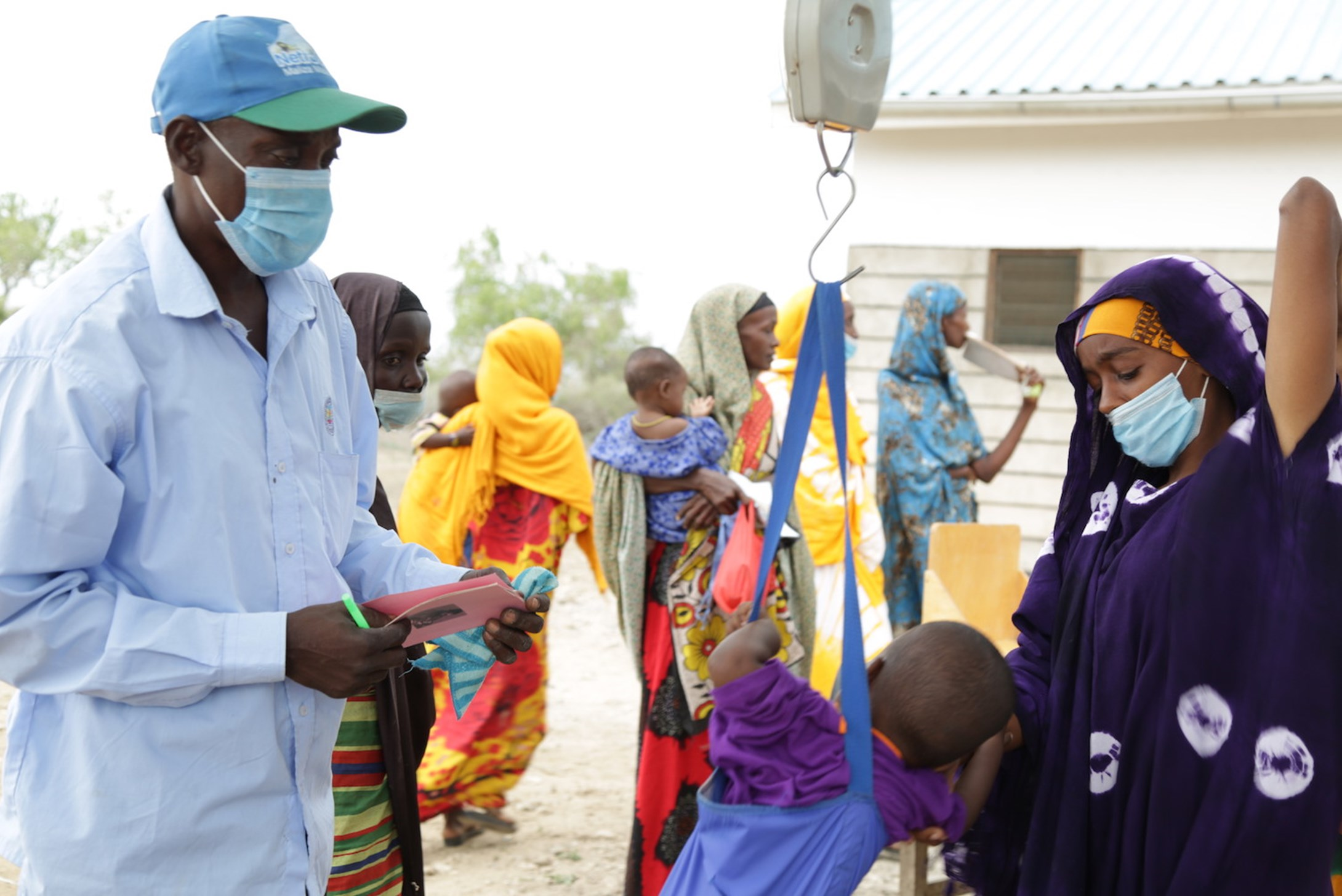 Marwan, a community health volunteer visiting homes and referring children with acute malnutrition to health facilities