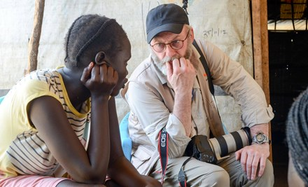 Liam Cunningham talking to a girl