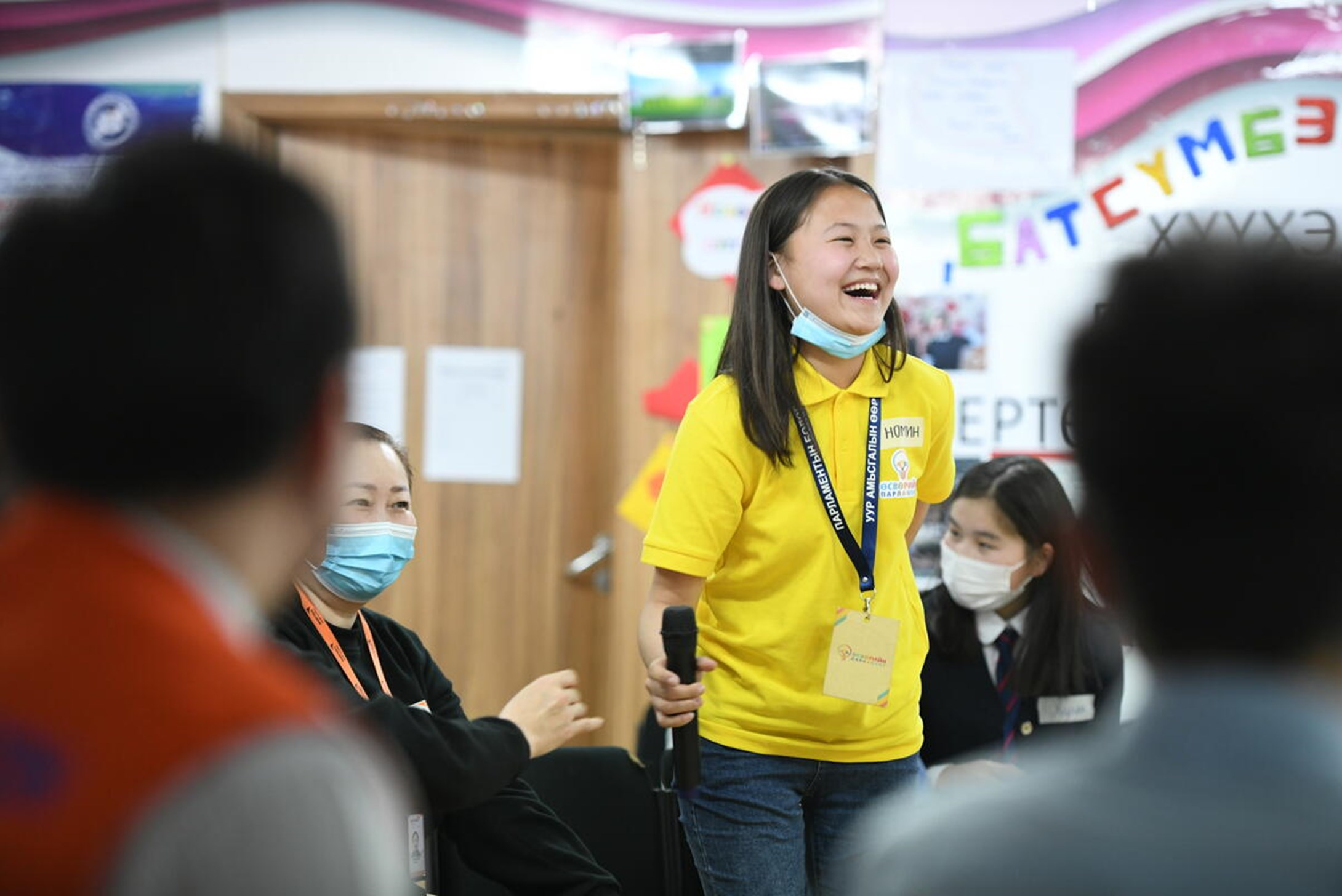 Nomin from Mongolia speaking before a group of people