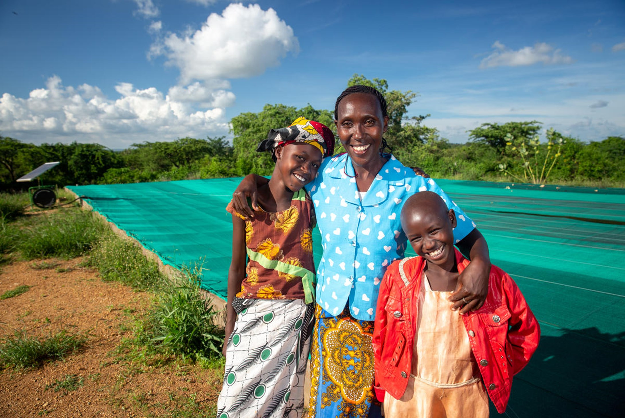 Felistus from Kenya with her two children