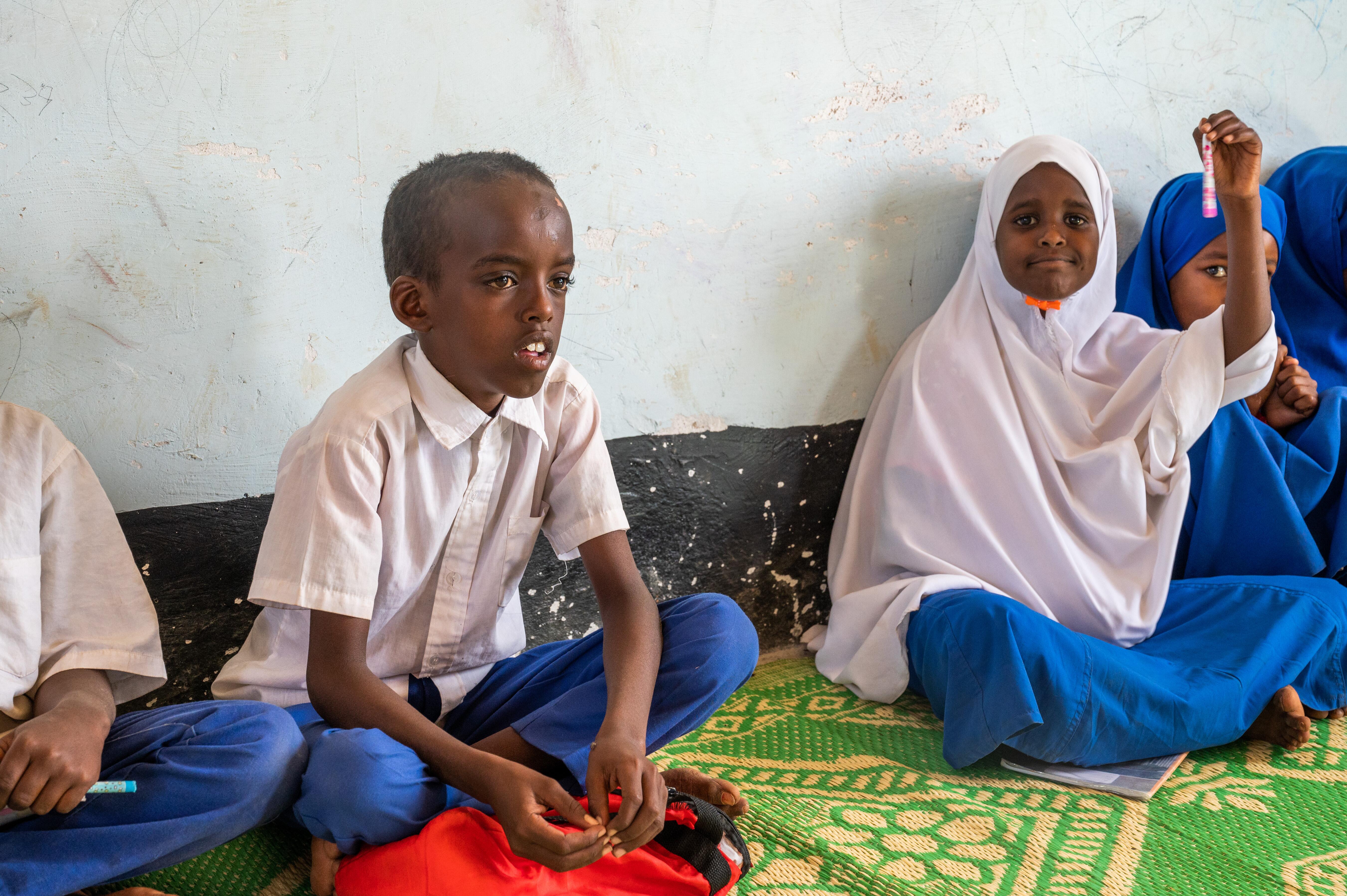 Said sitting in school in Somalia